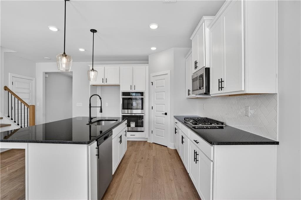 5 bedroom, 3 bathroom, 2,676 sq ft single family residence for sale at 407 Bass Circle LOT 36, Villa Rica, GA 30180 — photo 9