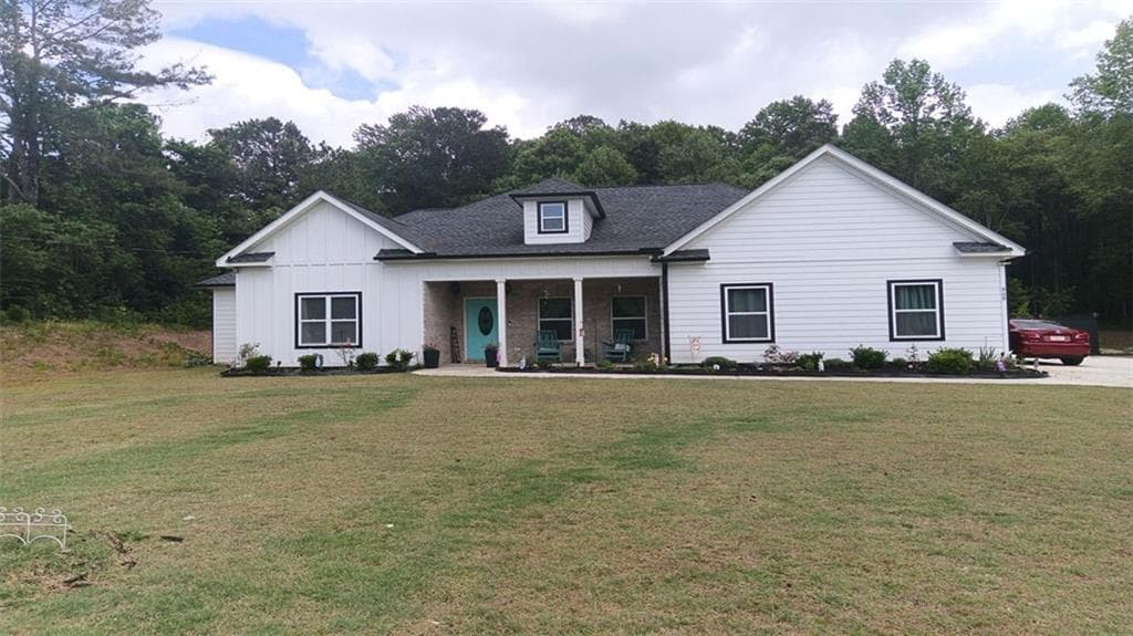 4 bedroom, 3 bathroom, 2,444 sq ft single family residence for sale at 909 Highway 314, Fayetteville, GA 30214 — photo 1 of 51
