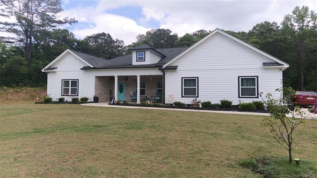 4 bedroom, 3 bathroom, 2,444 sq ft single family residence for sale at 909 Highway 314, Fayetteville, GA 30214 — photo 2