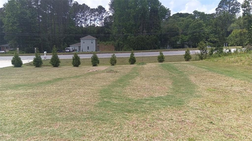 4 bedroom, 3 bathroom, 2,444 sq ft single family residence for sale at 909 Highway 314, Fayetteville, GA 30214 — photo 4