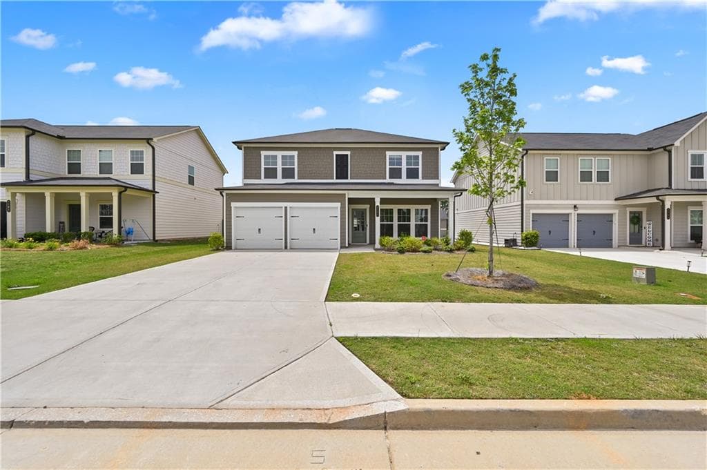 4 bedroom, 3 bathroom, 2,192 sq ft single family residence for sale at 2197 Boxwood Circle, Conyers, GA 30094 — photo 2