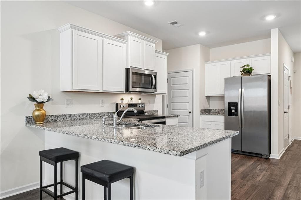 3 bedroom, 2 bathroom, 1,344 sq ft single family residence for sale at 8592 Seabiscuit Road, Lithonia, GA 30058 — photo 5