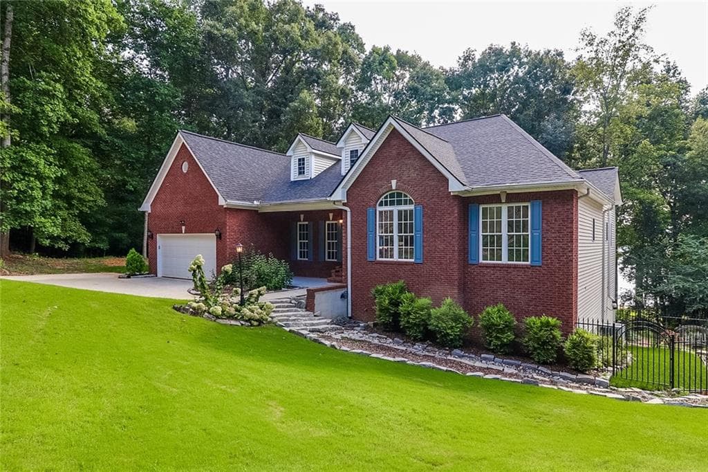 4 bedroom, 3 bathroom, 4,104 sq ft single family residence for rent at 6150 Six Mile Cove Road, Cumming, GA 30041 for $4,554 a month — photo 1 of 27