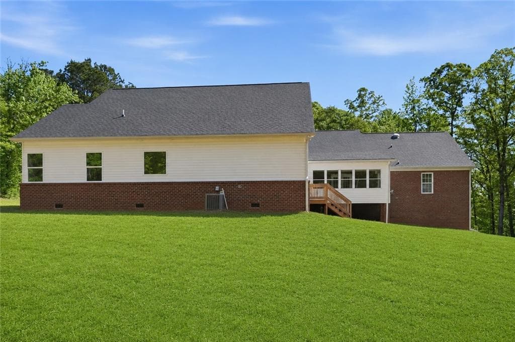 6 bedroom, 4 bathroom, 3,949 sq ft single family residence for sale at 314 Coady Road, Jackson, GA 30233 — photo 3