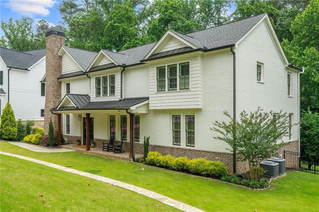 6 bedroom, 5 bathroom, 5,400 sq ft single family residence for sale at 2571 Winding Lane, Atlanta, GA 30319 — photo 2