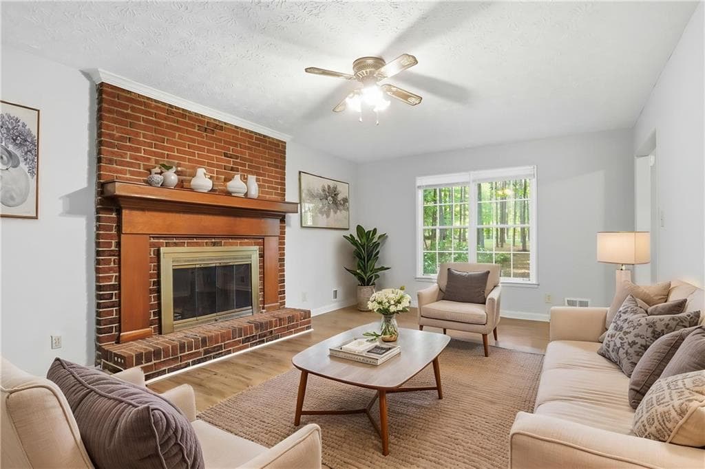 4 bedroom, 3 bathroom, 2,360 sq ft single family residence for sale at 105 Woodsong Court, Fayetteville, GA 30214 — photo 2