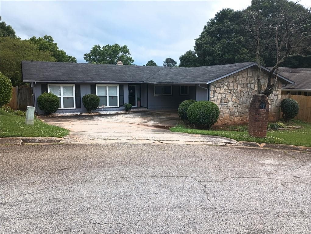 4 bedroom, 3 bathroom, 1,788 sq ft single family residence under contract at 4419 Carriage Trail, Stone Mountain, GA 30083