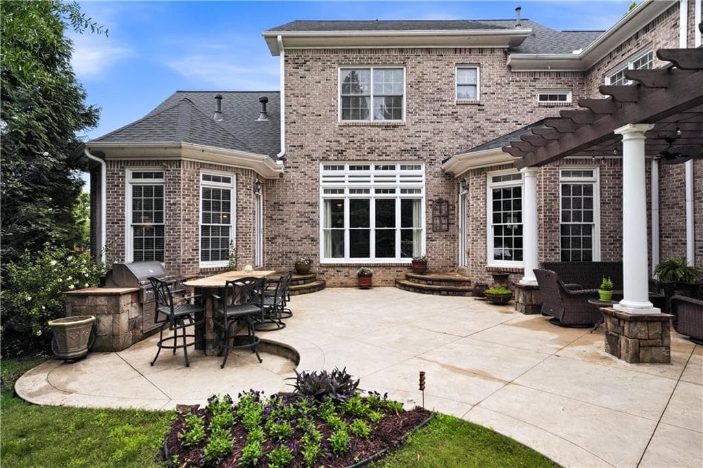 6 bedroom, 6 bathroom, 6,866 sq ft single family residence for sale at 2585 Shumard Oak Drive, Braselton, GA 30517 — photo 2