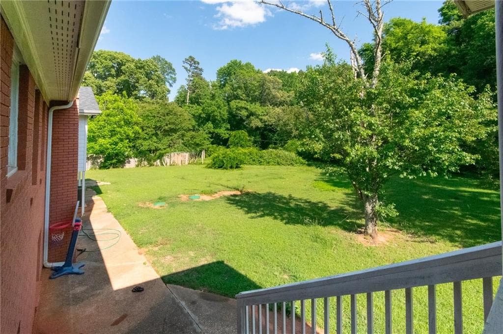 5 bedroom, 3 bathroom, 3,932 sq ft single family residence for sale at 6980 Rivertown Road, Fairburn, GA 30213 — photo 2