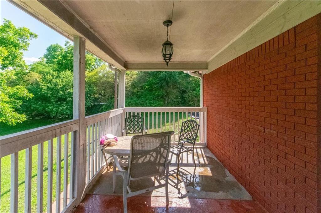 5 bedroom, 3 bathroom, 3,932 sq ft single family residence for sale at 6980 Rivertown Road, Fairburn, GA 30213 — photo 3