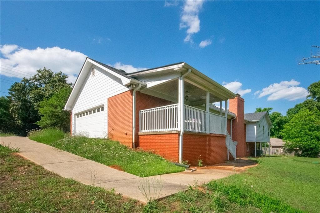 5 bedroom, 3 bathroom, 3,932 sq ft single family residence for sale at 6980 Rivertown Road, Fairburn, GA 30213 — photo 5