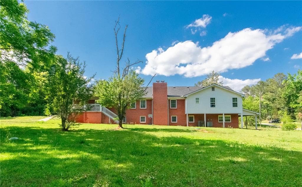 5 bedroom, 3 bathroom, 3,932 sq ft single family residence for sale at 6980 Rivertown Road, Fairburn, GA 30213 — photo 6