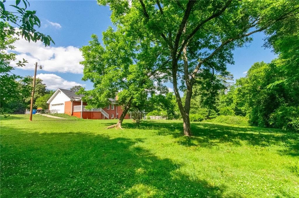 5 bedroom, 3 bathroom, 3,932 sq ft single family residence for sale at 6980 Rivertown Road, Fairburn, GA 30213 — photo 7