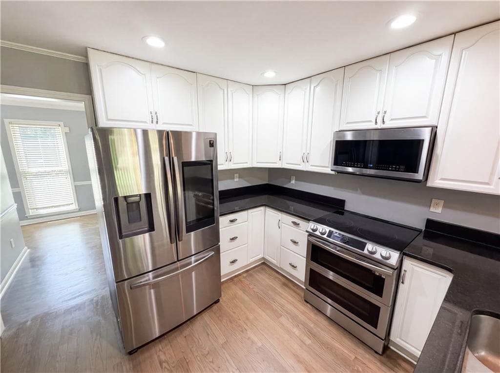 4 bedroom, 3 bathroom, 3,358 sq ft single family residence for sale at 1876 Geyser Trace, Lawrenceville, GA 30044 — photo 2