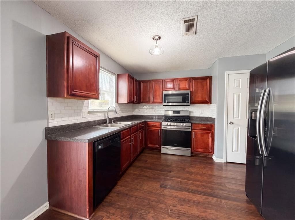 4 bedroom, 2 bathroom, 2,142 sq ft single family residence under contract at 4178 Winston Circle, Atlanta, GA 30349 — photo 2