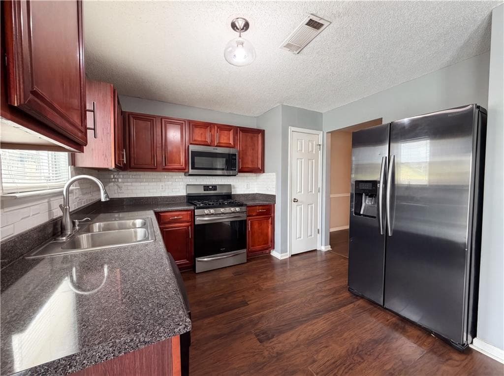 4 bedroom, 2 bathroom, 2,142 sq ft single family residence under contract at 4178 Winston Circle, Atlanta, GA 30349 — photo 6