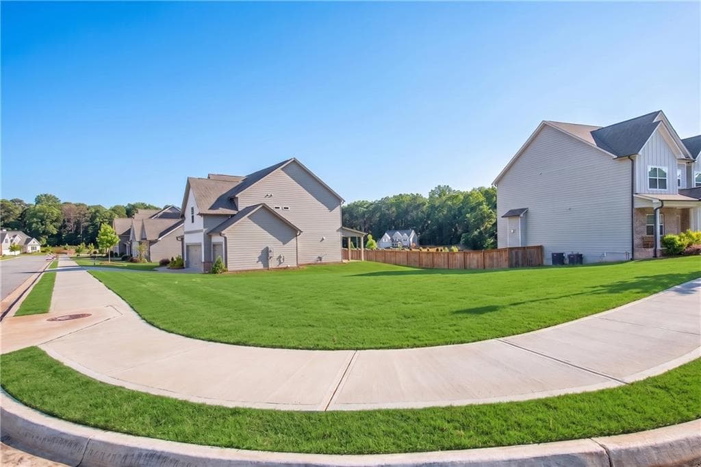 5 bedroom, 4 bathroom, 3,420 sq ft single family residence for sale at 146 Cherokee Rose Lane, Hoschton, GA 30548 — photo 4