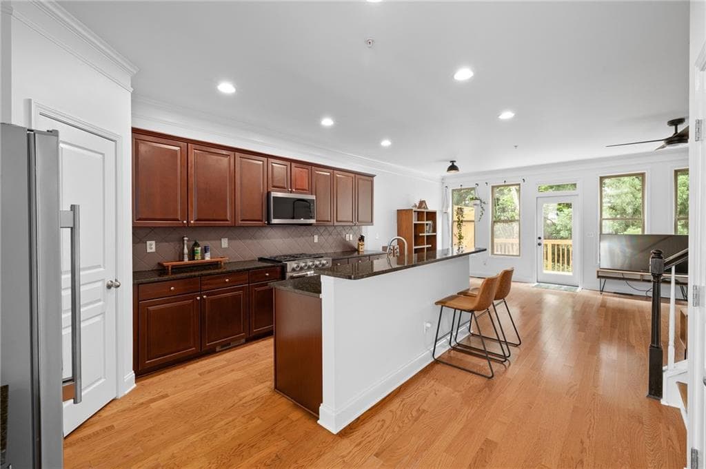 4 bedroom, 4 bathroom, 2,624 sq ft townhouse for sale at 9009 Woodland Trail, Alpharetta, GA 30009 — photo 6