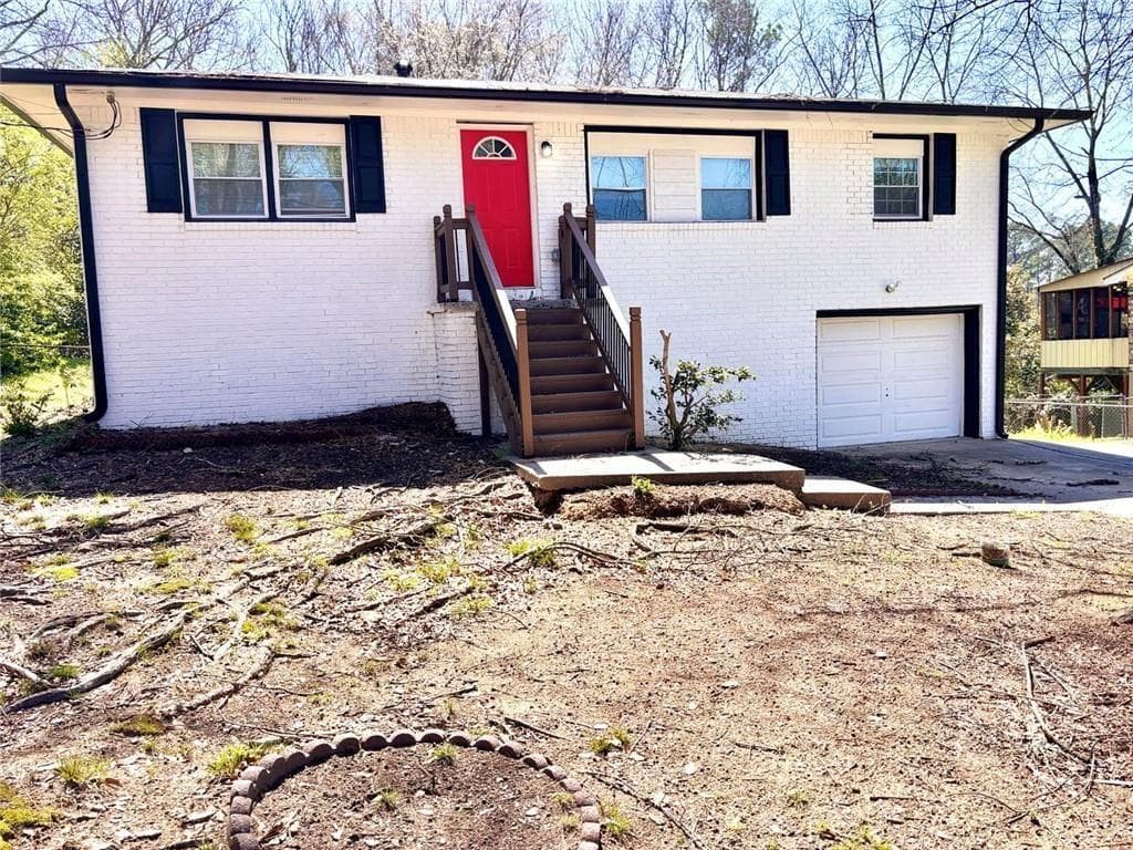 4 bedroom, 2 bathroom, 1,050 sq ft single family residence for sale at 2834 Green Trail Drive, Atlanta, GA 30349 — photo 1 of 34