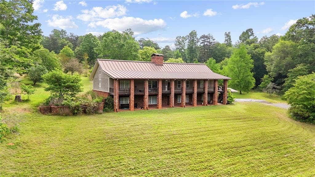 3 bedroom, 4 bathroom, 5,282 sq ft single family residence for sale at 4454 Ledan Extension, Gainesville, GA 30506 — photo 2