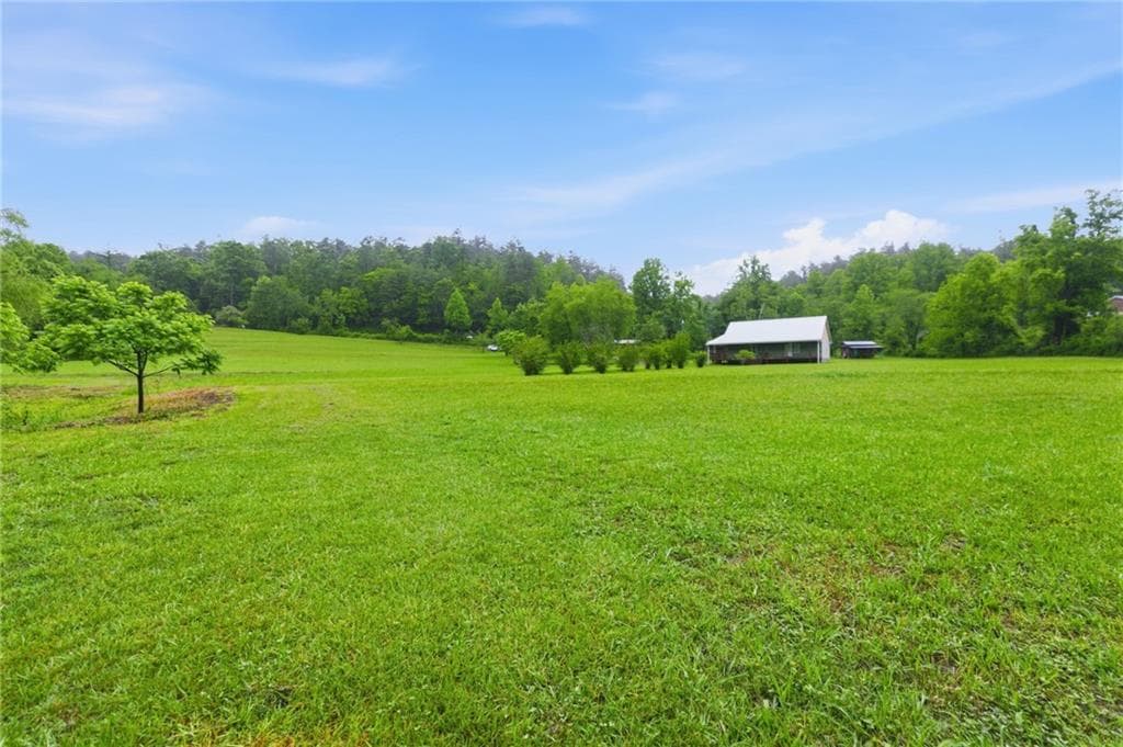 2 bedroom, 2 bathroom, 1,288 sq ft single family residence for sale at 6924 Warwoman Road, Clayton, GA 30525