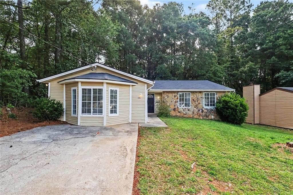 3 bedroom, 2 bathroom, 1,822 sq ft single family residence for sale at 2196 Scarbrough Drive, Stone Mountain, GA 30088 — photo 1 of 26