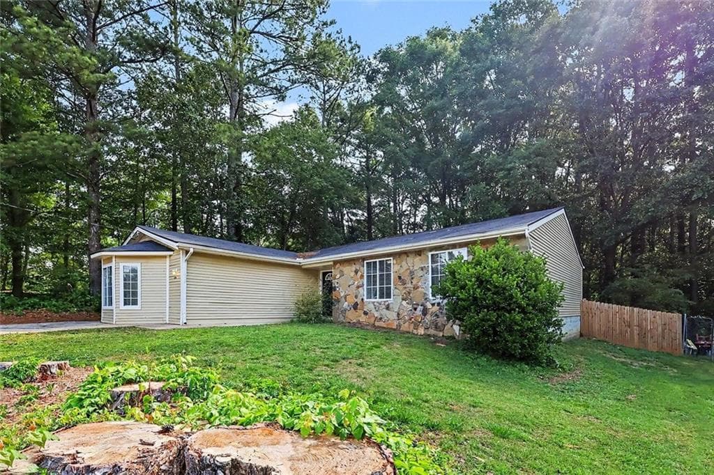 3 bedroom, 2 bathroom, 1,822 sq ft single family residence for sale at 2196 Scarbrough Drive, Stone Mountain, GA 30088 — photo 2