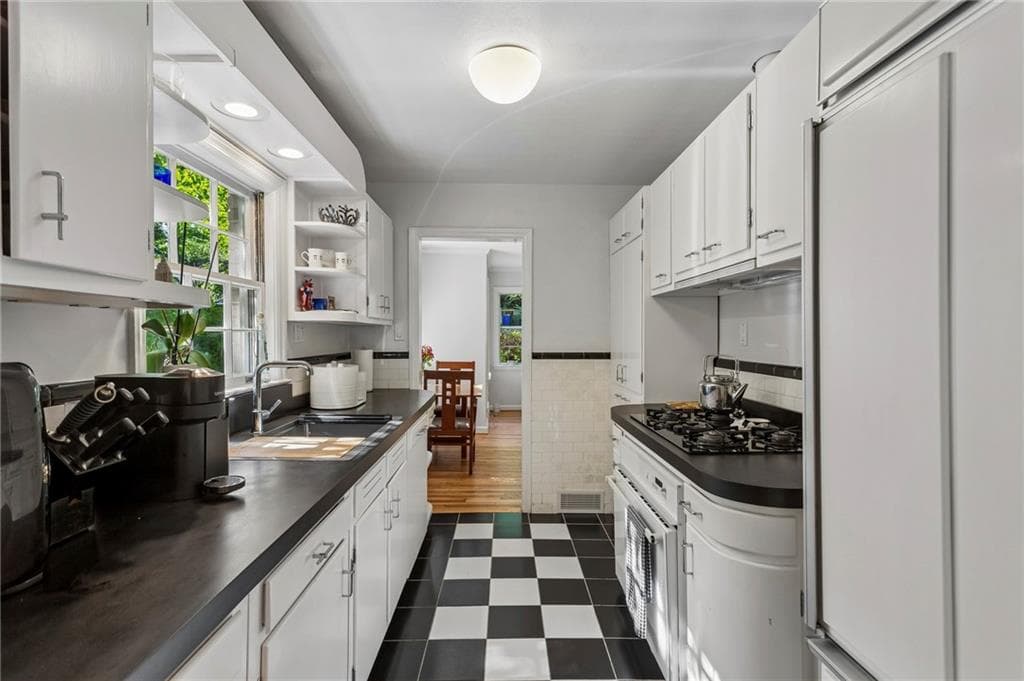 4 bedroom, 3 bathroom, 2,200 sq ft single family residence for sale at 681 Upton Road, Atlanta, GA 30318 — photo 3