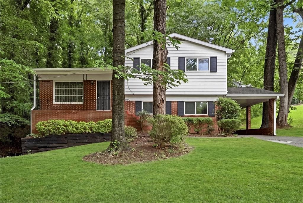 4 bedroom, 3 bathroom, 1,050 sq ft single family residence for sale at 799 Kings Grant Drive, Atlanta, GA 30318