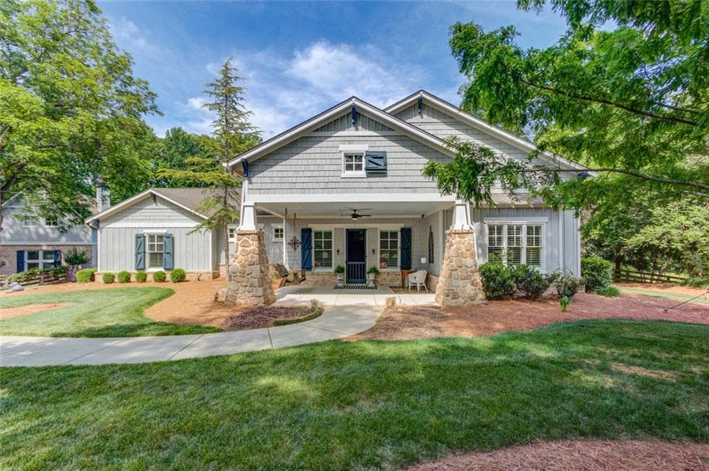 6 bedroom, 5 bathroom, 4,116 sq ft single family residence for sale at 5741 Shadburn Ferry Road, Buford, GA 30518