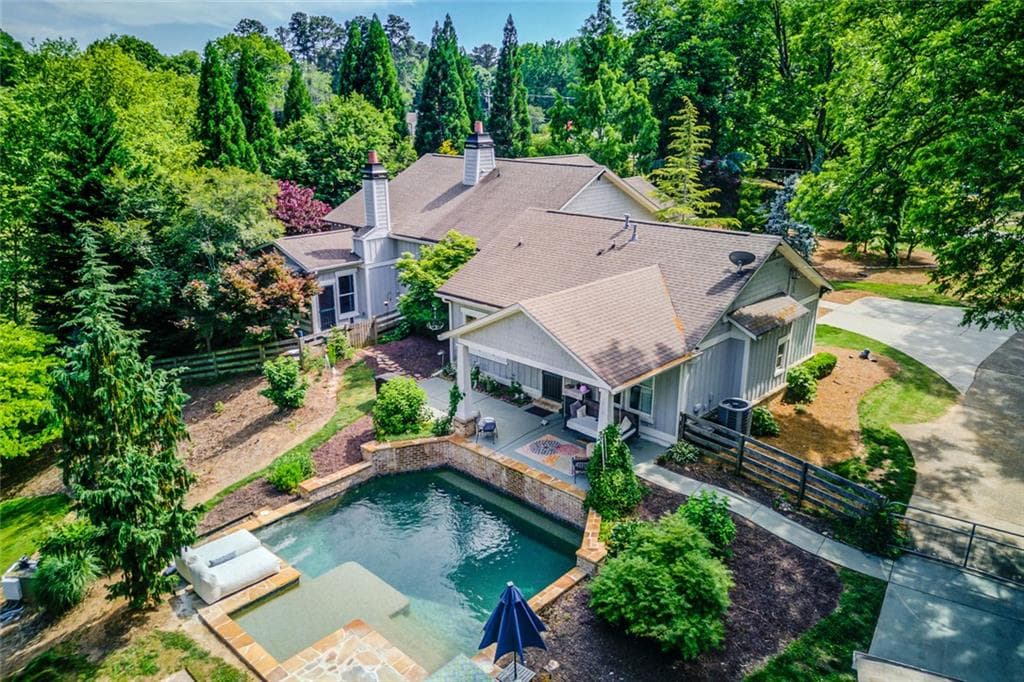 6 bedroom, 5 bathroom, 4,116 sq ft single family residence for sale at 5741 Shadburn Ferry Road, Buford, GA 30518 — photo 3