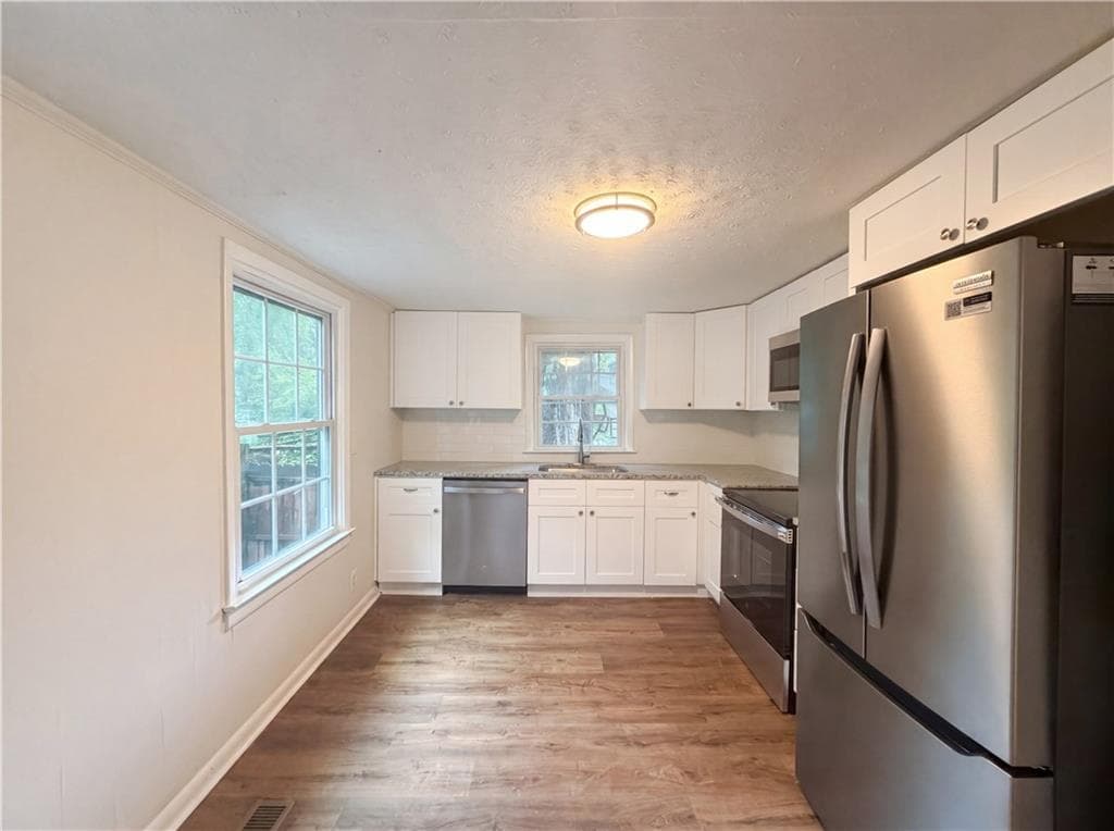 2 bedroom, 1 bathroom, 896 sq ft single family residence for sale at 710 Milton Street, Scottdale, GA 30079 — photo 7