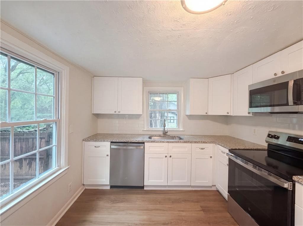 2 bedroom, 1 bathroom, 896 sq ft single family residence for sale at 710 Milton Street, Scottdale, GA 30079 — photo 9