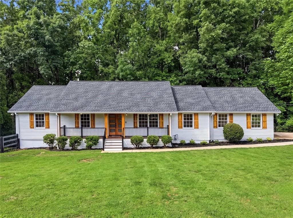 5 bedroom, 3 bathroom, 3,292 sq ft single family residence for sale at 2595 Marsha Circle, Cumming, GA 30041 — photo 1 of 33