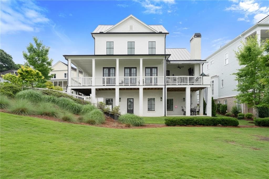 5 bedroom, 4 bathroom, 4,000 sq ft single family residence for sale at 7170 Lullwater Road, Cumming, GA 30040 — photo 2