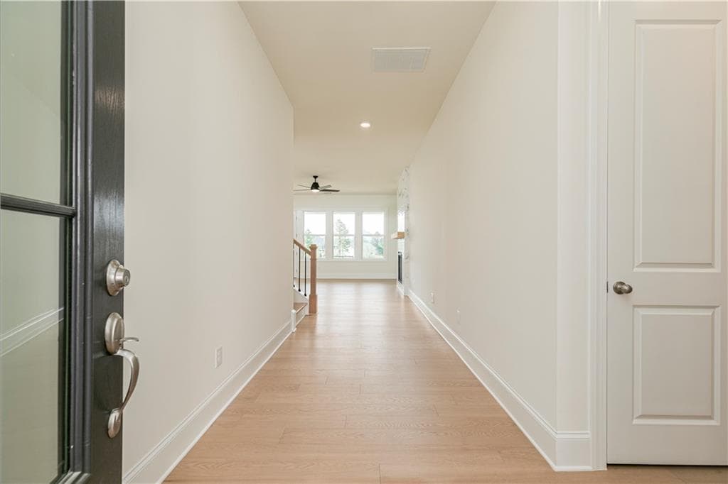 4 bedroom, 4 bathroom, 3,046 sq ft single family residence for sale at 6520 Wallace Farms Drive, Cumming, GA 30028 — photo 4