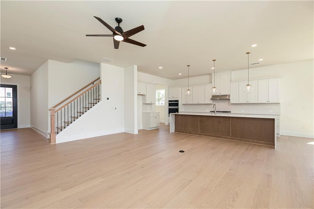 4 bedroom, 4 bathroom, 3,046 sq ft single family residence for sale at 6520 Wallace Farms Drive, Cumming, GA 30028 — photo 8