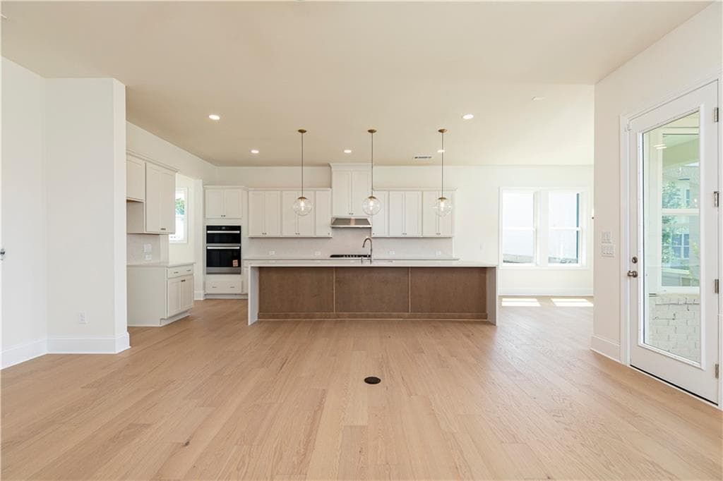 4 bedroom, 4 bathroom, 3,046 sq ft single family residence for sale at 6520 Wallace Farms Drive, Cumming, GA 30028 — photo 9
