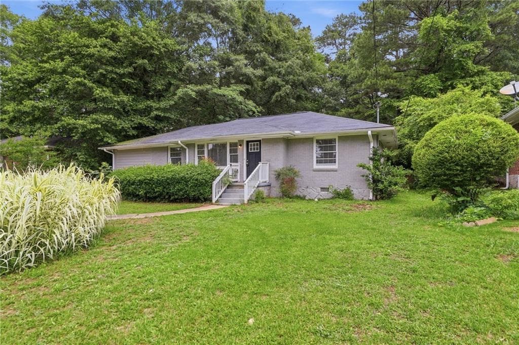 4 bedroom, 2 bathroom, 1,156 sq ft single family residence for sale at 3332 Mcafee Road, Decatur, GA 30032 — photo 2