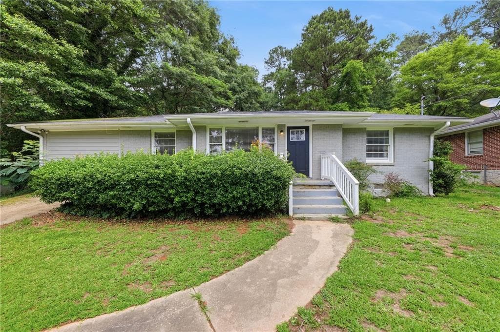 4 bedroom, 2 bathroom, 1,156 sq ft single family residence for sale at 3332 Mcafee Road, Decatur, GA 30032 — photo 3