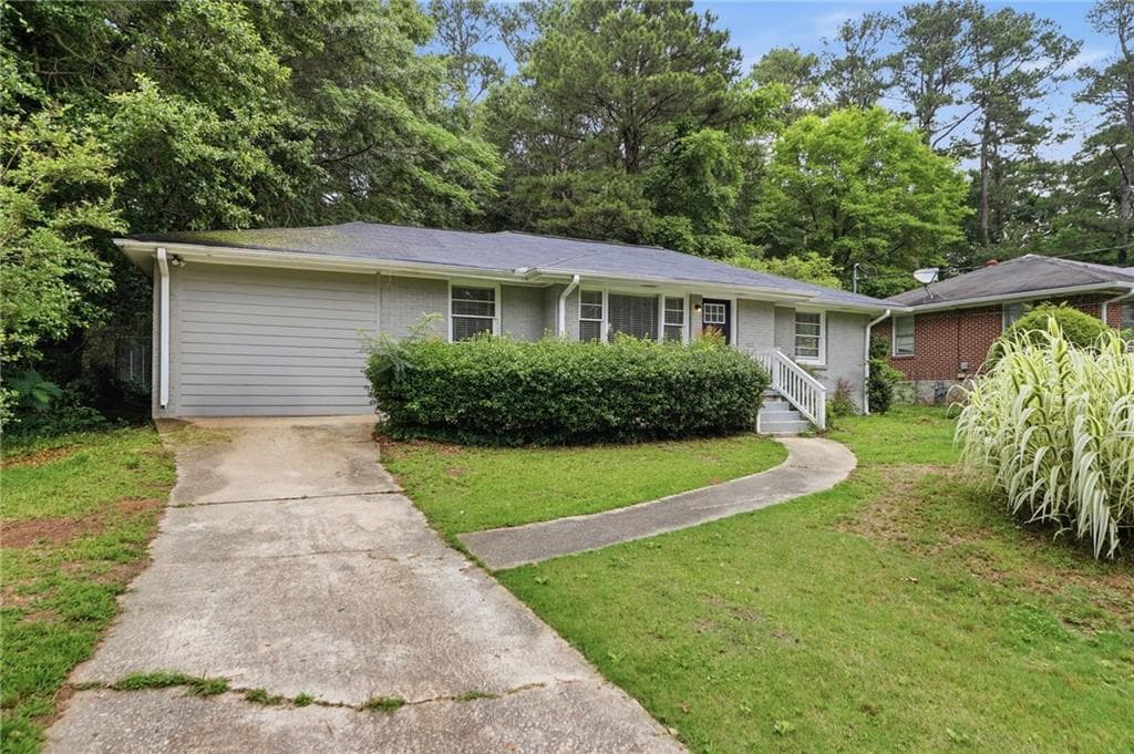 4 bedroom, 2 bathroom, 1,156 sq ft single family residence for sale at 3332 Mcafee Road, Decatur, GA 30032 — photo 4