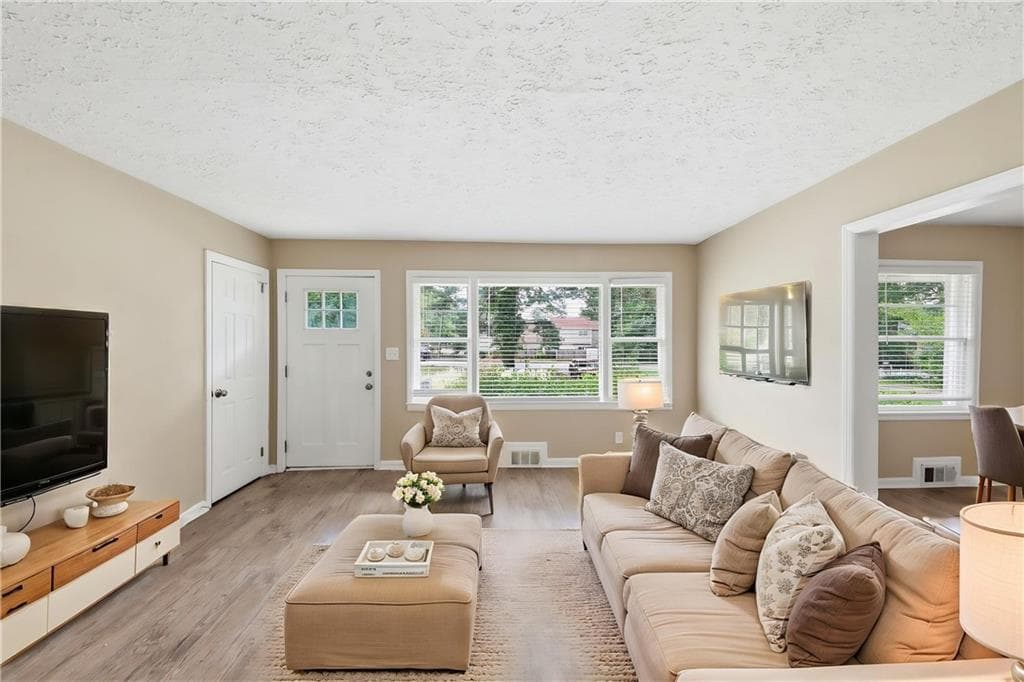 4 bedroom, 2 bathroom, 1,156 sq ft single family residence for sale at 3332 Mcafee Road, Decatur, GA 30032 — photo 5