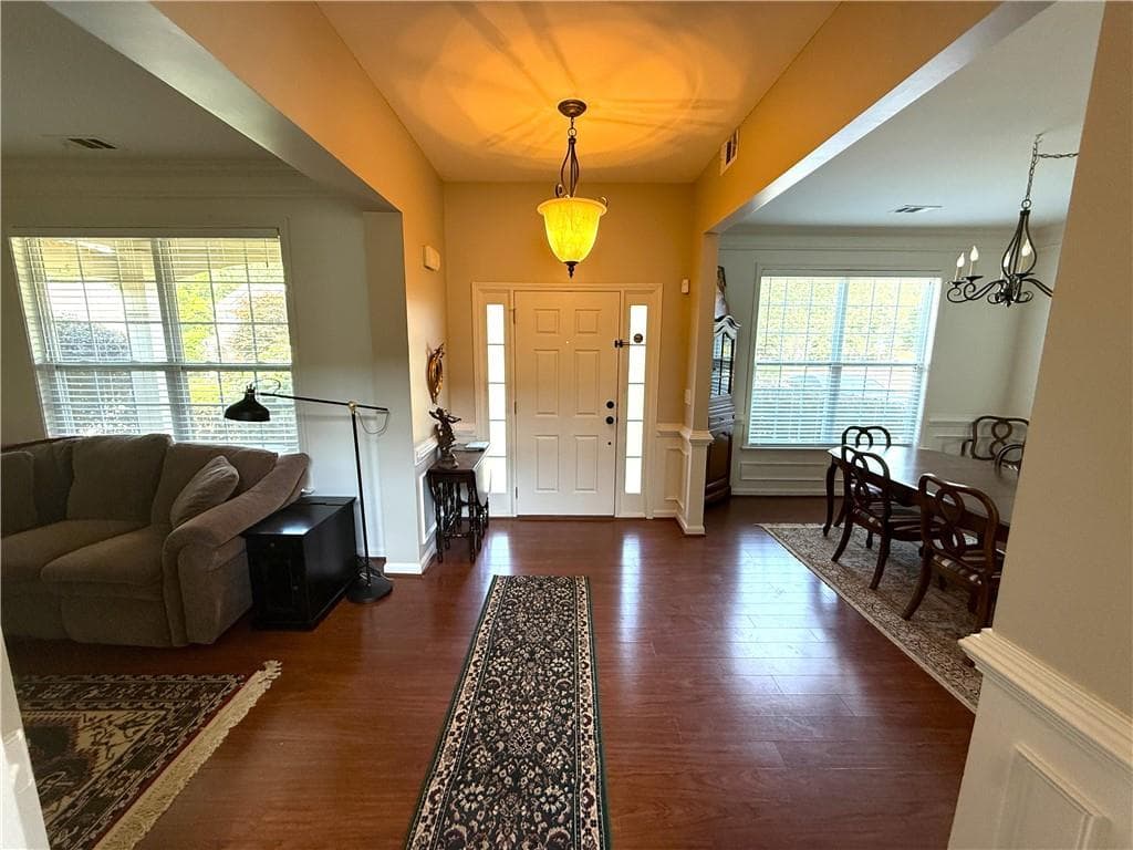4 bedroom, 3 bathroom, 2,646 sq ft single family residence for sale at 6640 Grand Magnolia Drive, Buford, GA 30518 — photo 2