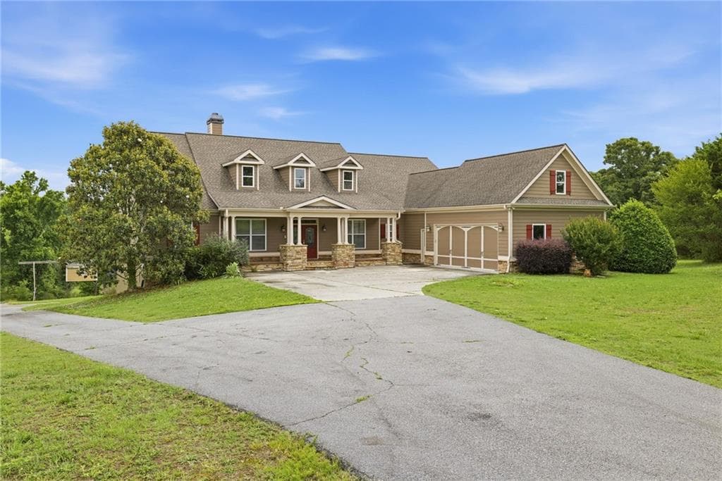 5 bedroom, 4 bathroom, 3,996 sq ft single family residence for sale at 1173 Dee Kennedy Road, Auburn, GA 30011 — photo 2
