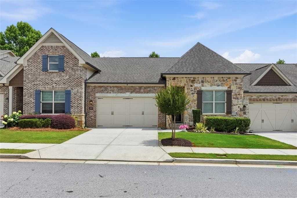 3 bedroom, 4 bathroom, 3,258 sq ft townhouse for sale at 337 Rosshandler Road, Suwanee, GA 30024 — photo 1 of 45