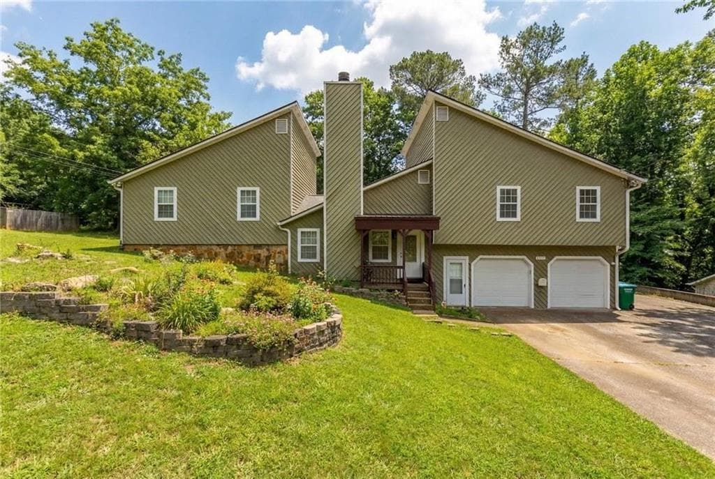 4 bedroom, 3 bathroom, 1,928 sq ft single family residence for sale at 3720 Quail Hollow Trail, Snellville, GA 30039 — photo 1 of 34
