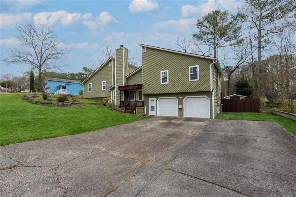 4 bedroom, 3 bathroom, 1,928 sq ft single family residence for sale at 3720 Quail Hollow Trail, Snellville, GA 30039 — photo 2