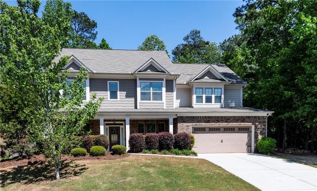 5 bedroom, 3 bathroom, 3,671 sq ft single family residence for sale at 5645 Pleasant Woods Drive, Flowery Branch, GA 30542 — photo 1 of 24