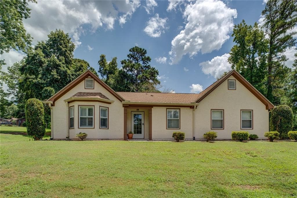 3 bedroom, 2 bathroom, 1,936 sq ft single family residence under contract at 4938 Lake Forest Drive, Conyers, GA 30094