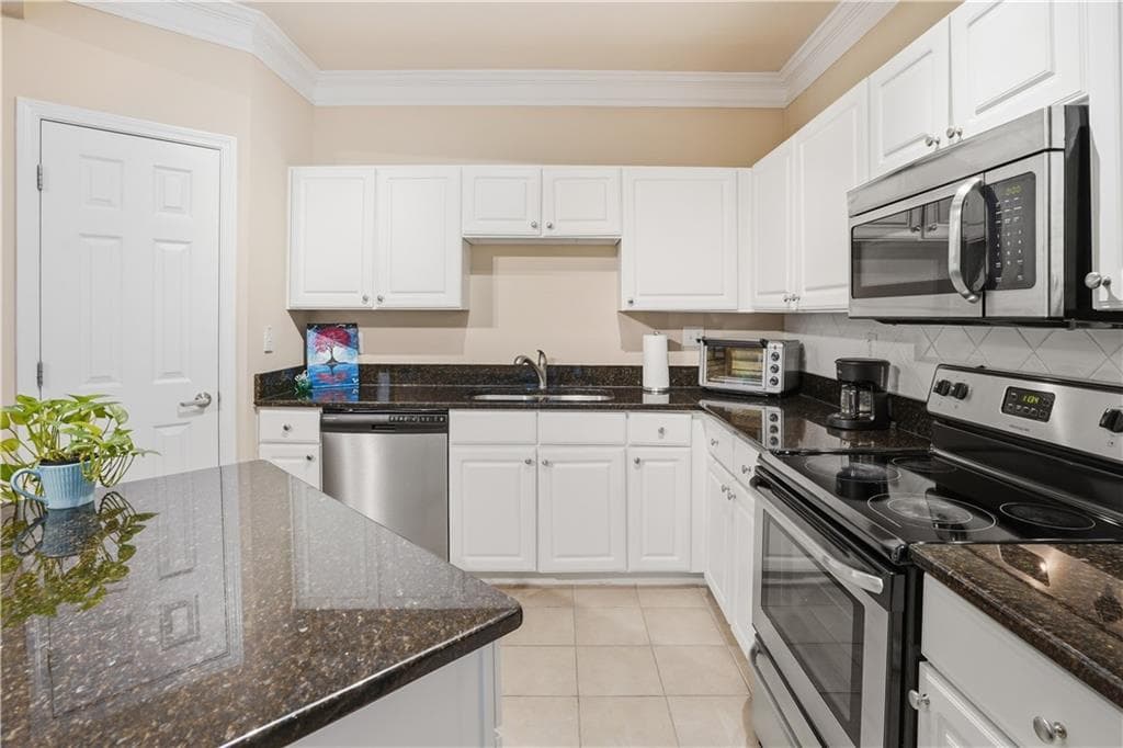 1 bedroom, 1 bathroom, 815 sq ft condominium for sale at 1850 Cotillion Drive 3222, Atlanta, GA 30338 — photo 9